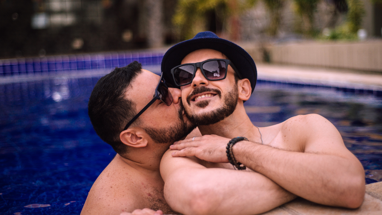 Gay Couple in pool in Panama City Hotel
